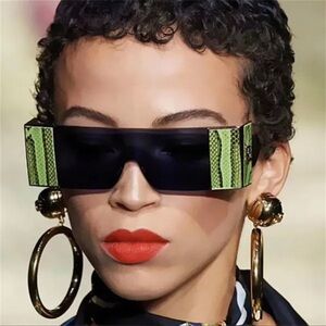 Futuristic Green and Black Sunglasses with Textured Design